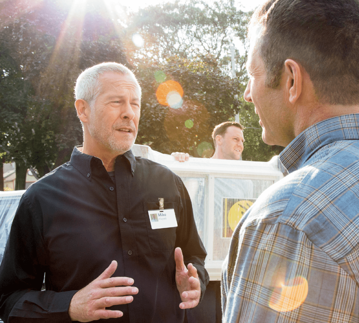 Supervisor explaining a window project