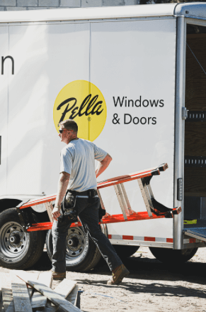 carrying a ladder by a pella truck by licensed installer for parts and service